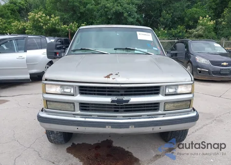 1998 Chevrolet K1500 Fleetside z USA, uszkodzony, nr VIN 2GCEK19R9W1253869